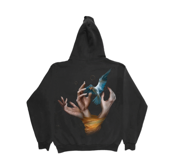 Black Imagine Dragons Smoke + Mirrors hoodie with large back graphic of realistic hands unwrapping a blue bird in flight detailed artistic design