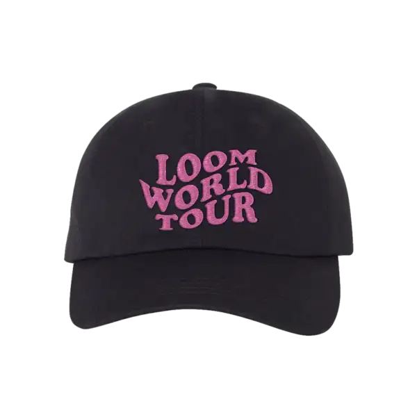 Black dad hat with curved brim featuring bold pink embroidered text that reads LOOM WORLD TOUR on the front inspired by Imagine Dragons merch