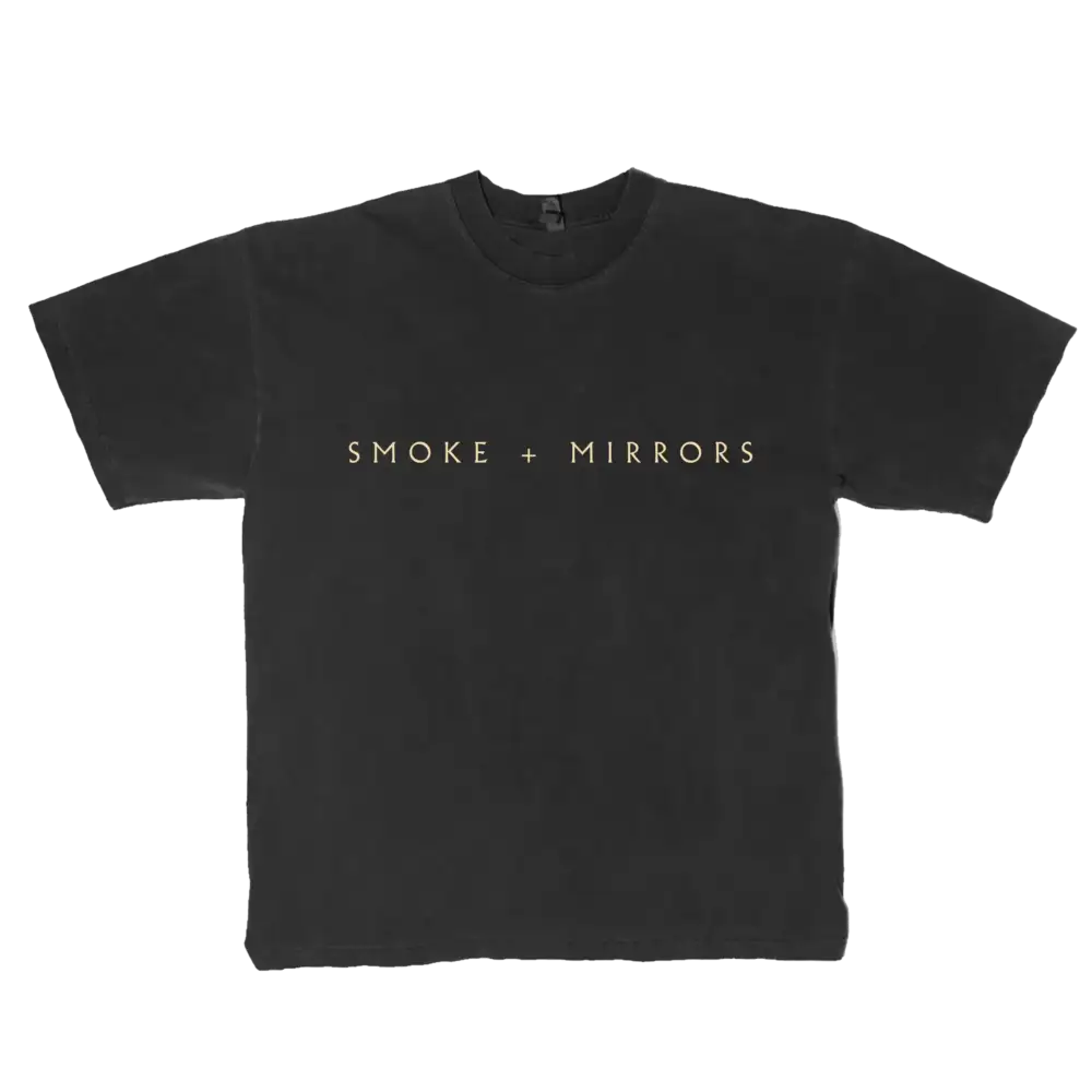 Front view of Hummingbird Tee showing a small hummingbird graphic over the heart on black fabric official Imagine Dragons T Shirt in unisex fit