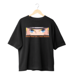 Naruto Merch T-Shirt front design with sticker of Naruto’s eyes and text saying “Behind these eyes a beast awakens